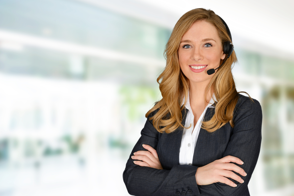 Technical Support woman with casual crossed arms wearing a headset